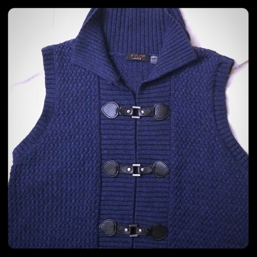 Navy blue sleeveless sweater.